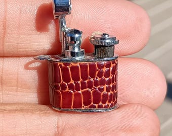Miniature vintage keychain 1940s lighter.
