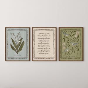 May include: Three framed art prints. The left print features a lily of the valley illustration. The center print has handwritten text. The right print displays birds and floral elements. All prints have decorative borders and are in wooden frames.