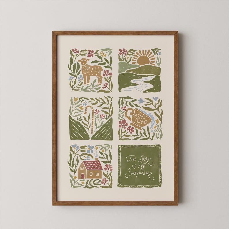 May include: A framed art print in a brown wooden frame. The print displays six illustrated squares with pastoral scenes, including a lamb, a sunrise, a river, a shepherd's crook, a cup, and a house. The text "The Lord is my Shepherd" is in a green square.