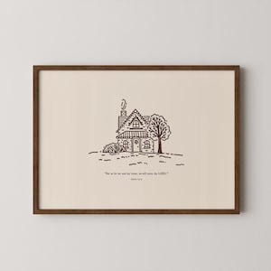 Può includere: Una stampa incorniciata con un disegno a tratto di una casa, un albero e del testo. L'opera d'arte è in una cornice marrone con uno sfondo beige. Il testo recita: "Ma io e la mia casa serviremo il SIGNORE." (Giosuè 24:15).