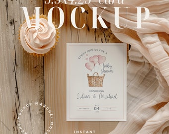 May include: A 5.5x4.25 inch card mockup with a pink cupcake and a white card with a watercolor illustration of a basket with pink heart balloons. The card text reads "Kindly join us for a baby shower honoring Lilian & Michael Saturday May 04 2013 2 PM".