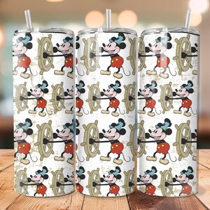 May include: Three white insulated tumblers with a repeating pattern of Mickey Mouse at the helm of a ship's wheel. Mickey is wearing his classic red shorts, yellow shoes, and blue hat. The tumblers have clear straws and black lids.