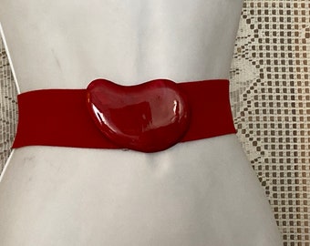 Red elastic belt with red plastic medallion 80's Fashion