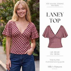 May include: A PDF digital sewing pattern for the Laney Top, featuring a V-neck blouse with flutter sleeves in a red and cream plaid print. The illustration shows the garment construction with US sizes 00-22 and EU sizes 30-54 listed.