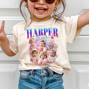 May include: Cream-colored t-shirt featuring the name "HARPER Bloom" in a gradient blue and pink font. Below the text is a collage of baby photos. The shirt is worn by a child.