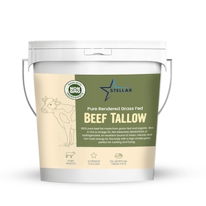 May include: White plastic bucket with a green and white label. The label says "STELLAR Pure Rendered Grass Fed BEEF TALLOW 100% pure beef fat made from grass-fed and organic. Rich in CLA & omega 3's. Not bleached, deodorized, or hydrogenated. An excellent source of clean, natural, and non-toxic energy for the body with a high smoke point perfect for cooking and frying. PURE WAGYU SUPERIOR FLAVOUR 0% ARTIFICIAL TRANS FATS"