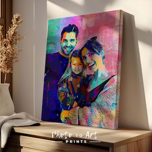 May include: A vibrant pop art style canvas print featuring a family of three. The artwork uses bold colors and brushstrokes to depict a smiling man, woman, and child. The text "Photo to Art PRINTS" is at the bottom.