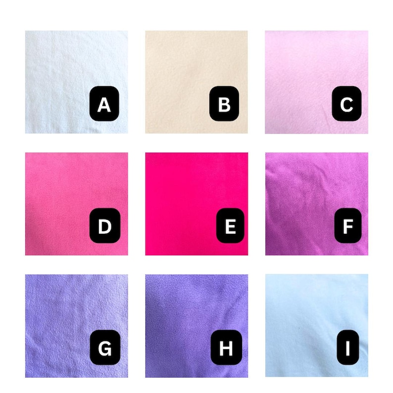 May include: A grid of nine fabric swatches labeled A through I, displaying a variety of solid colors including white, beige, light pink, hot pink, magenta, purple, lavender, and light blue, each with a soft, matte, and uniform texture.
