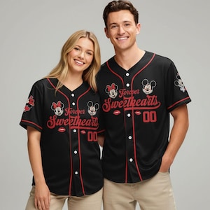 May include: Black baseball jersey with red trim and the words "Forever Sweethearts" in red script. The jersey features Mickey and Minnie Mouse graphics and the number "00".