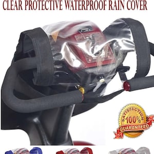 May include: Clear plastic cover for a mobility scooter control panel and tiller. The cover is designed to protect the controls from rain and other elements. The cover is made of clear plastic and has a black fabric border. The cover is shown in three different colours: blue, red, and white.