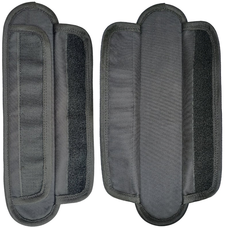 May include: Two black fabric straps with hook and loop fasteners. The straps are designed to be attached to a bag or other item.
