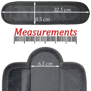 May include: Black fabric strap with measurements in inches. The strap is 12.8 inches long and 3.3 inches wide. A smaller black fabric strap is 2.6 inches wide.