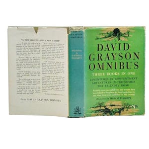 May include: A vintage hardcover book titled "David Grayson Omnibus" with a green cover and illustrations by Thomas Fogarty. The book includes three stories: "Adventures in Contentment," "Adventures in Friendship," and "The Friendly Road."
