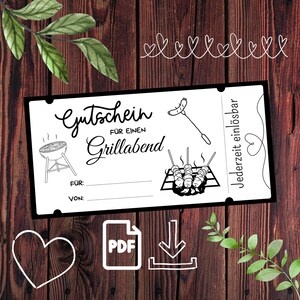 May include: A black and white gift certificate with the words "Gutschein für einen Grillabend" and illustrations of a grill, sausage, and skewers. The certificate includes spaces for "FÜR" and "VON" and is set against a dark wood background.