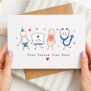 May include: A white greeting card featuring a cartoon syringe, nurse cap, adhesive bandage, and stethoscope with smiling faces. The card includes small red hearts and blue and orange stars, with the text Your Custom Text Here printed below.