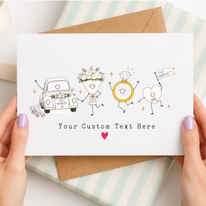 May include: A white greeting card featuring a cartoon illustration of a car with a Just Married sign, a flower bouquet, a diamond ring, and a heart character holding a flag that says Just Married. Below the characters is the text Your Custom Text Here.