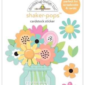 May include: A set of shaker-pops cardstock stickers featuring a mason jar filled with colorful flowers. The stickers are perfect for scrapbooking and card making.