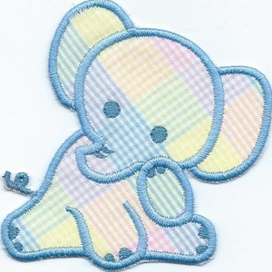 May include: A blue and yellow checkered fabric elephant applique with blue stitching. The elephant is sitting with its trunk curled up.