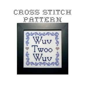 May include: Cross stitch pattern with a blue and white frame. The pattern says "Wuv Two Wuv" with two small hearts.