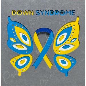 May include: A gray card with the text "DOWN SYNDROME" in white letters. A yellow and blue butterfly with a blue and yellow ribbon in the center.