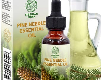 May include: A bottle of Siberian Green Pine Needle Essential Oil with a black dropper cap, next to its rectangular box and a glass carafe of light yellow oil. The label and box feature pine cone and needle imagery with 1.0 fl. oz. text.
