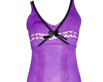 May include: Purple satin slip dress with black lace trim and a black bow at the neckline.