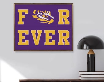 May include: Wooden framed wall art with the word "FOREVER" in yellow block letters on a purple background. The letter "O" is replaced with a yellow and gold tiger eye design. The artwork is mounted on a white wall.