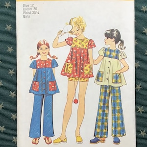 SIMPLICITY #5602~~Vintage 1973~~Girls’ Smock~~Pants~~Shorts~~Size 12~~Breast 30”~~Waist 25 1/2”~~Sewing Pattern