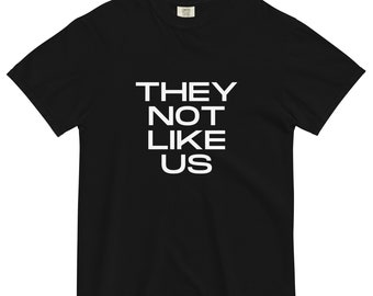 Camiseta de peso pesado "No les gustamos"