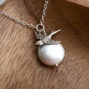 Coin pearl necklace, bird necklace, sparrow charm on freshwater coin pearl, sterling silver chain