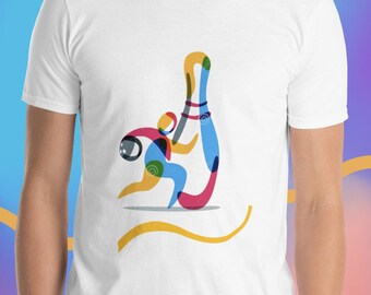 May include: White t-shirt with a colorful graphic design of a person bowling. The graphic is stylized and abstract, with the person and bowling pin depicted in a simplified, geometric style.