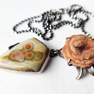 Ocean Jasper pendant in cream, orange and green set in sterling silver.