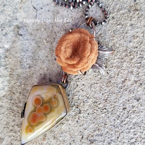 Art gemstone pendant made of high quality ocean jasper, baryte rose, and sterling silver.