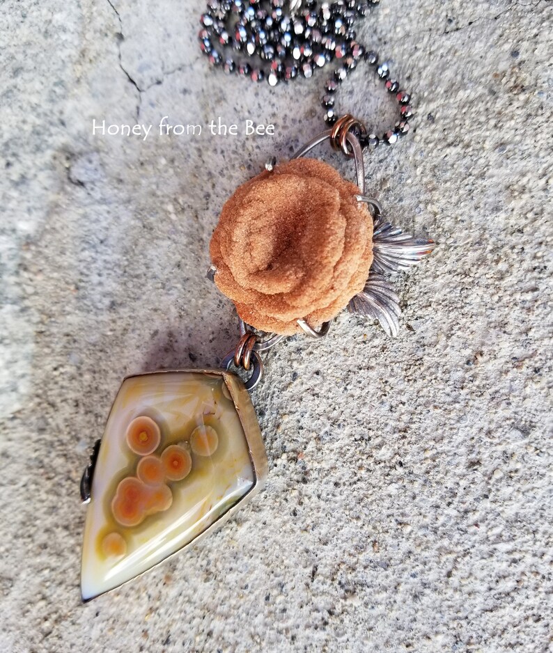 Art gemstone pendant made of high quality ocean jasper, baryte rose, and sterling silver.