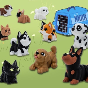 May include: A collection of colorful dog and cat figurines, including a Dalmatian, Husky, and a black cat. A blue pet carrier is also present. The figurines are set against a light green background with white flower accents.
