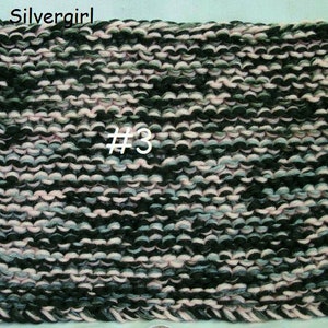 May include: A close-up of a knitted fabric swatch in black, pink, and grey colours. The swatch is labelled with the number "#3".
