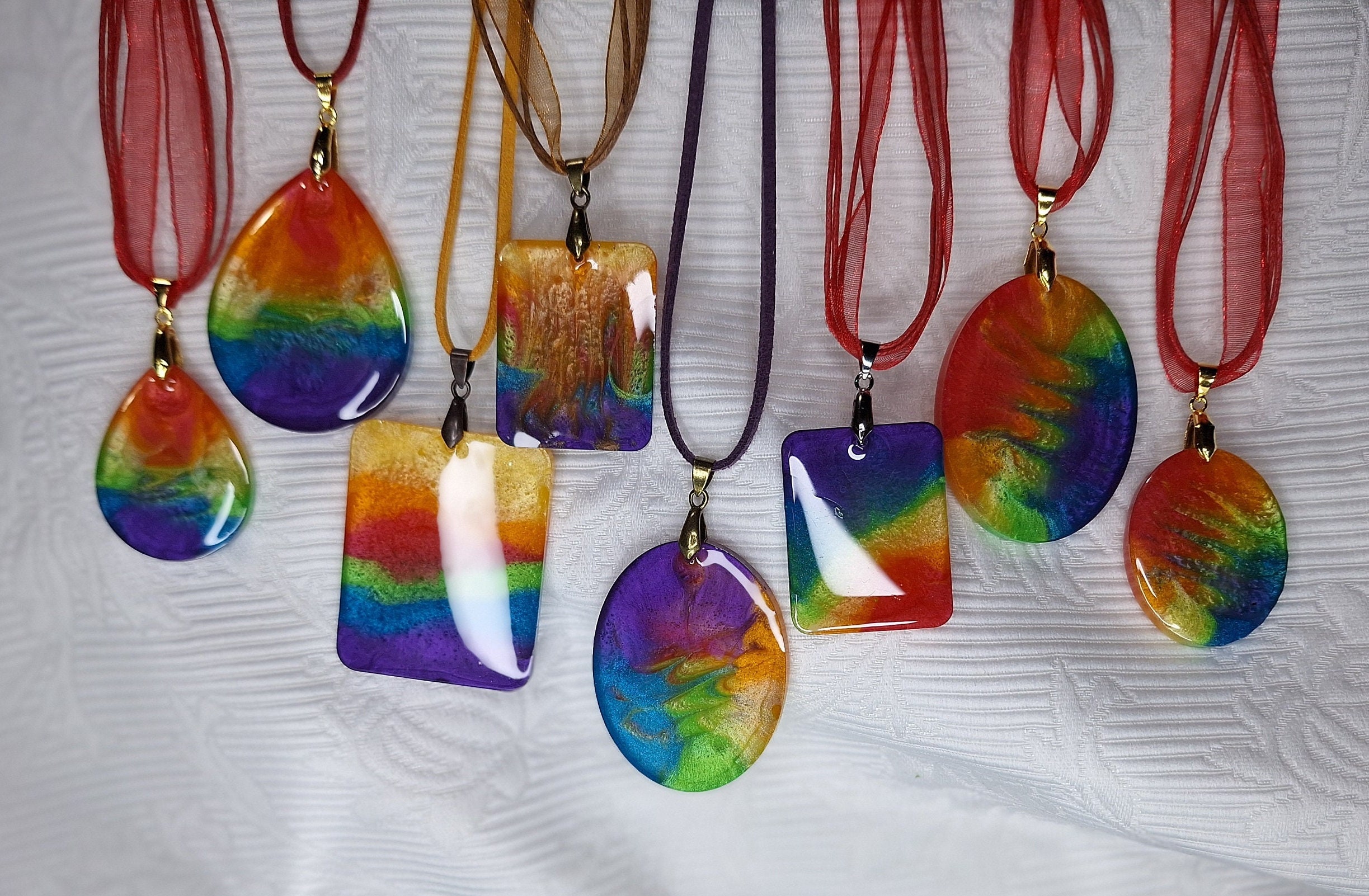 Several Handmade Resin Pendant Necklaces With Sparkly Rainbow Mica ...