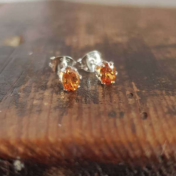 Little spessartine garnet earrings. Genuine orange garnet stud earrings. 4x3mm oval gemstone studs.