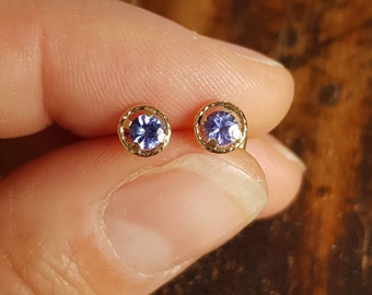 Genuine tanzanite studs. Tanzanite earrings. Little tanzanite and gold halo stud earrings. Yellow gold studs. December birthstone earrings.