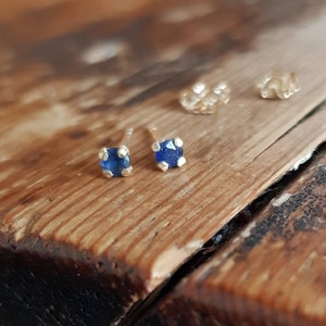 Very tiny blue sapphire earrings. Genuine sapphire stud earrings. Natural sapphire, 9ct solid gold yellow studs. September birthstone.