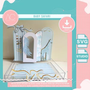 May include: A digital craft file set featuring a Baby Safari theme with light blue and white striped panels, a white archway, a giraffe silhouette, and decorative ribbon accents. The design includes text reading Baby Safari and SVG and STUDIO icons.