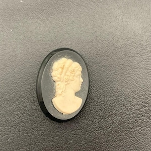 Vintage Black And Ivory Colored Resin Cameo Brooch