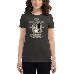 May include: A dark gray women's t-shirt with a vintage-style illustration of a Boston Terrier dog. The illustration is surrounded by text that reads "Old Stink Eye Pure Rye Whiskey".
