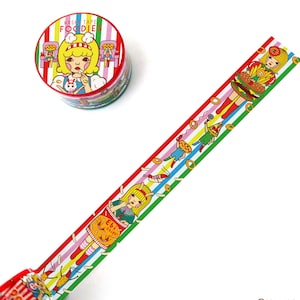 May include: A roll of colourful washi tape with a repeating pattern of cartoon girls eating different foods. The tape is on a white background. The tape dispenser is red, white and blue with a cartoon girl eating a burger. The text on the dispenser says "Washi Tape Foodies".