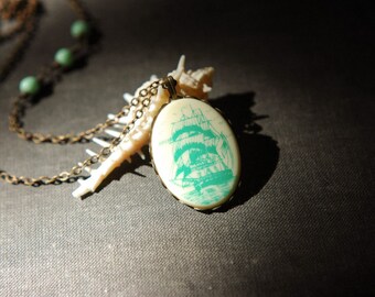 Nautical vintage mint green ship cameo necklace with asymmetric beads.