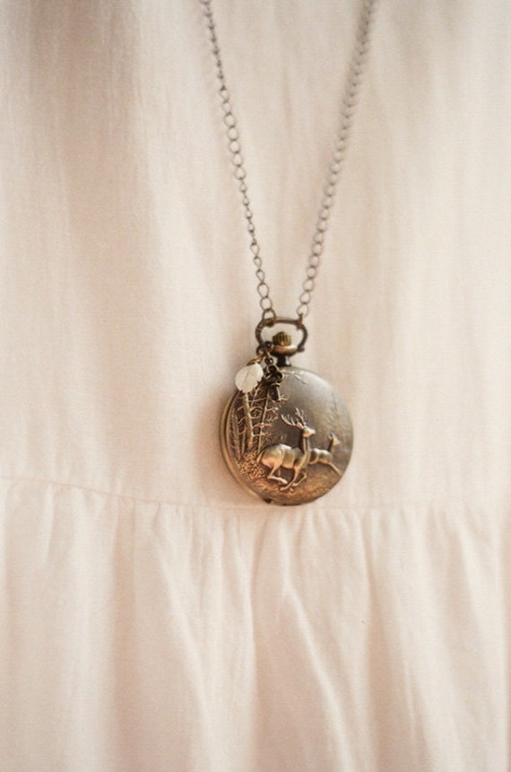 Items similar to Antique bronze pocket watch necklace featuring a