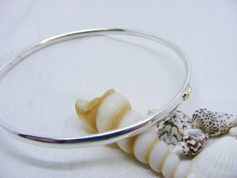 mixed metals 22cm Circumference Silver bangle with gold open heart gift for her