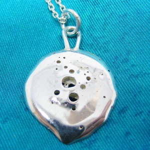 Bubble disc jewellery, hallmarked silver jewellery creation by UK designer fluidbydesign