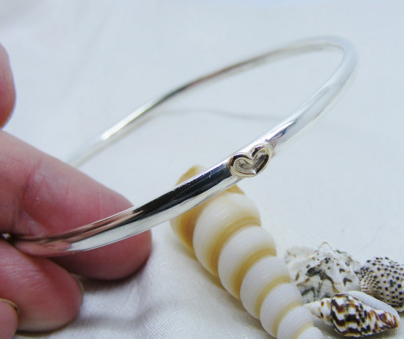 mixed metals 22cm Circumference Silver bangle with gold open heart gift for her