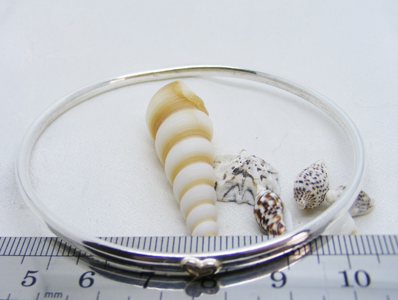 mixed metals 22cm Circumference Silver bangle with gold open heart gift for her